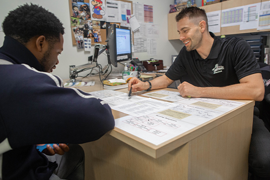 Norco College Counselor Jethro Midgett with student Norco College Counselor Jethro Midgett with student