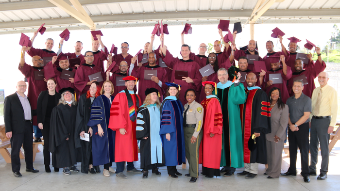 Prison Education Program graduates hats off with leadership Prison Education Program graduates hats off with leadership