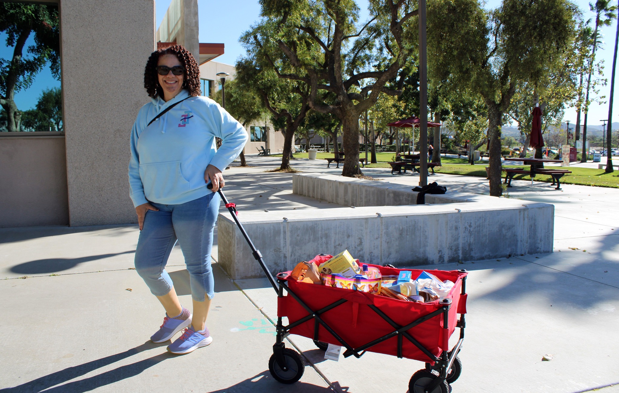 Member of Pomona Chapter of Jack and Jill of America, Inc. with donated items