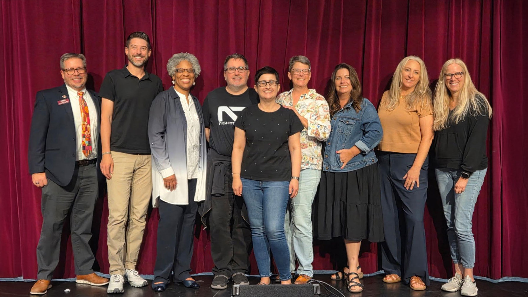 Adviye Tolunay, Ph.D., center, pictured with attendees after presenting the 64th RCCD Distinguished Faculty Lecture at Norco College.