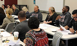 Norco College classified professionals in discussion at Staff Development Day