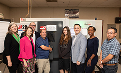 Norco College managers at machinery donation