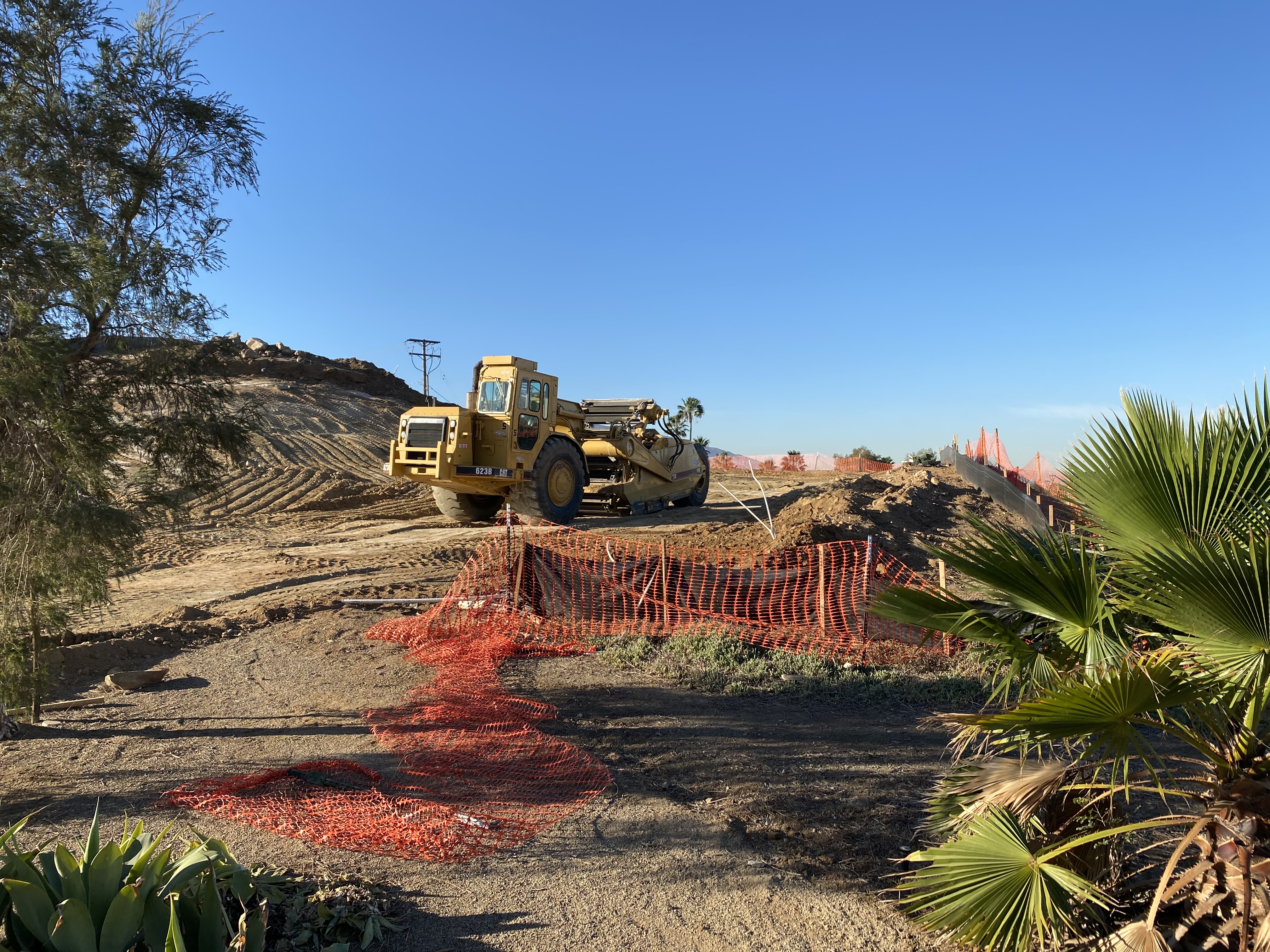 Grading and preparing the building pad
