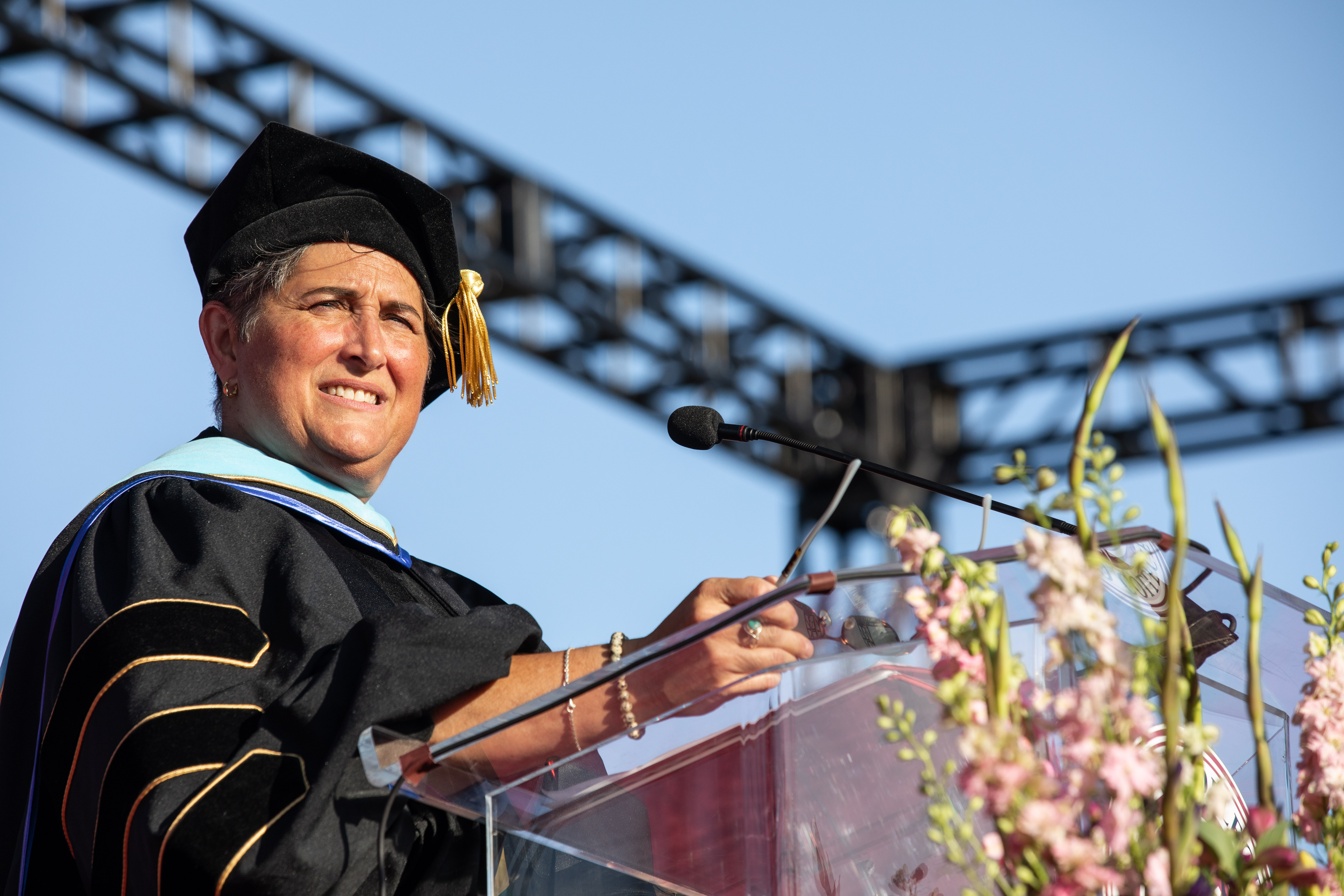 Commencement Faculty Speaker Dr. Peggy Campo speaking at 2022 Norco College Commencement